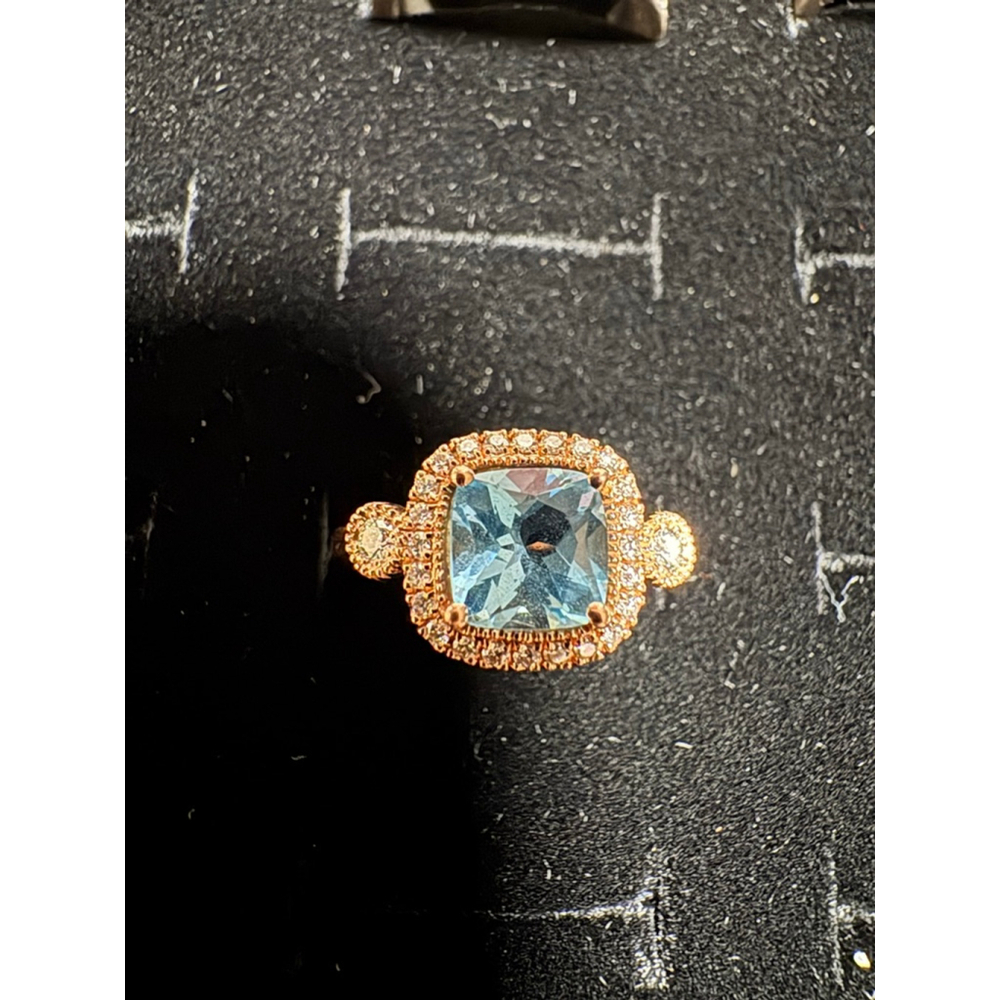 Women's 14k rose gold blue topaz and real diamond ring size 7